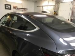 Gray Tesla Before Car Window Tinting